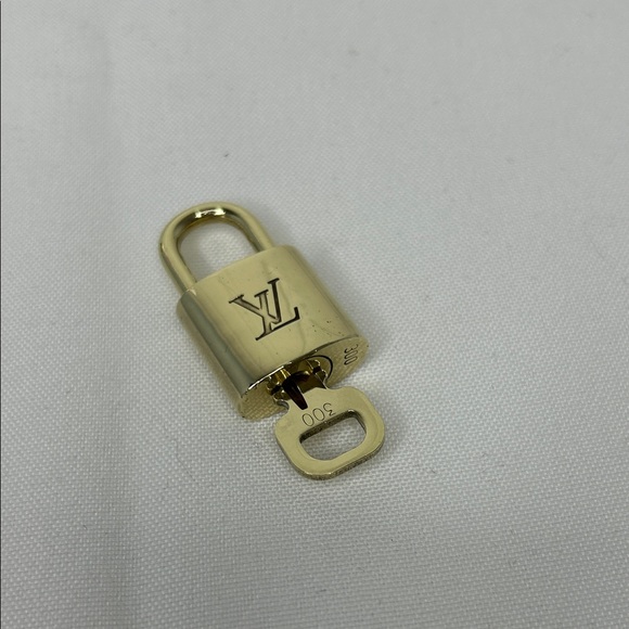 Louis Vuitton Other - Louis Vuitton Lock Number 300 Just cleaned With Brass Polish Great Condition